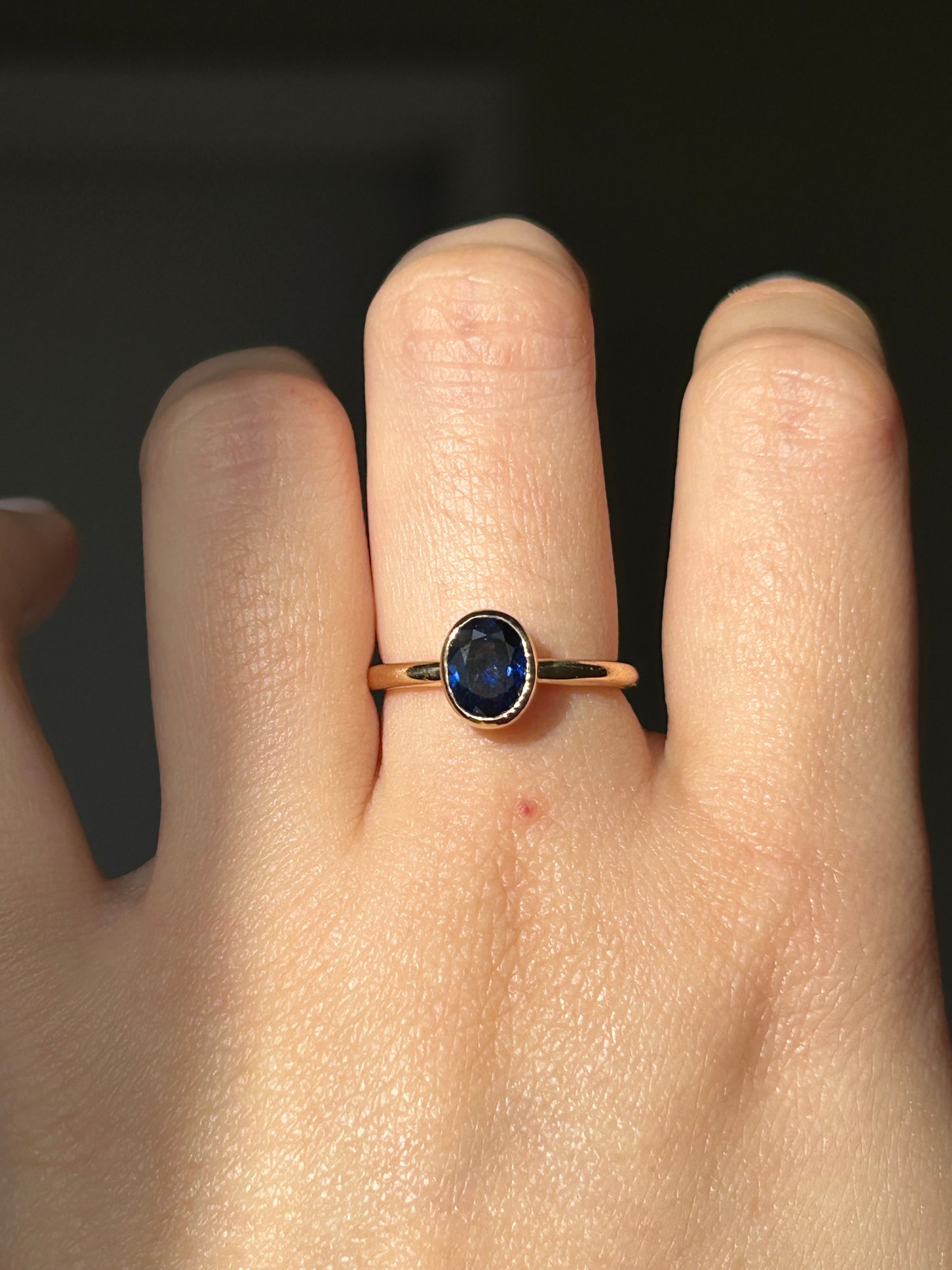 Modern 18k Gold Bezel Set Deep Blue Sapphire Ring