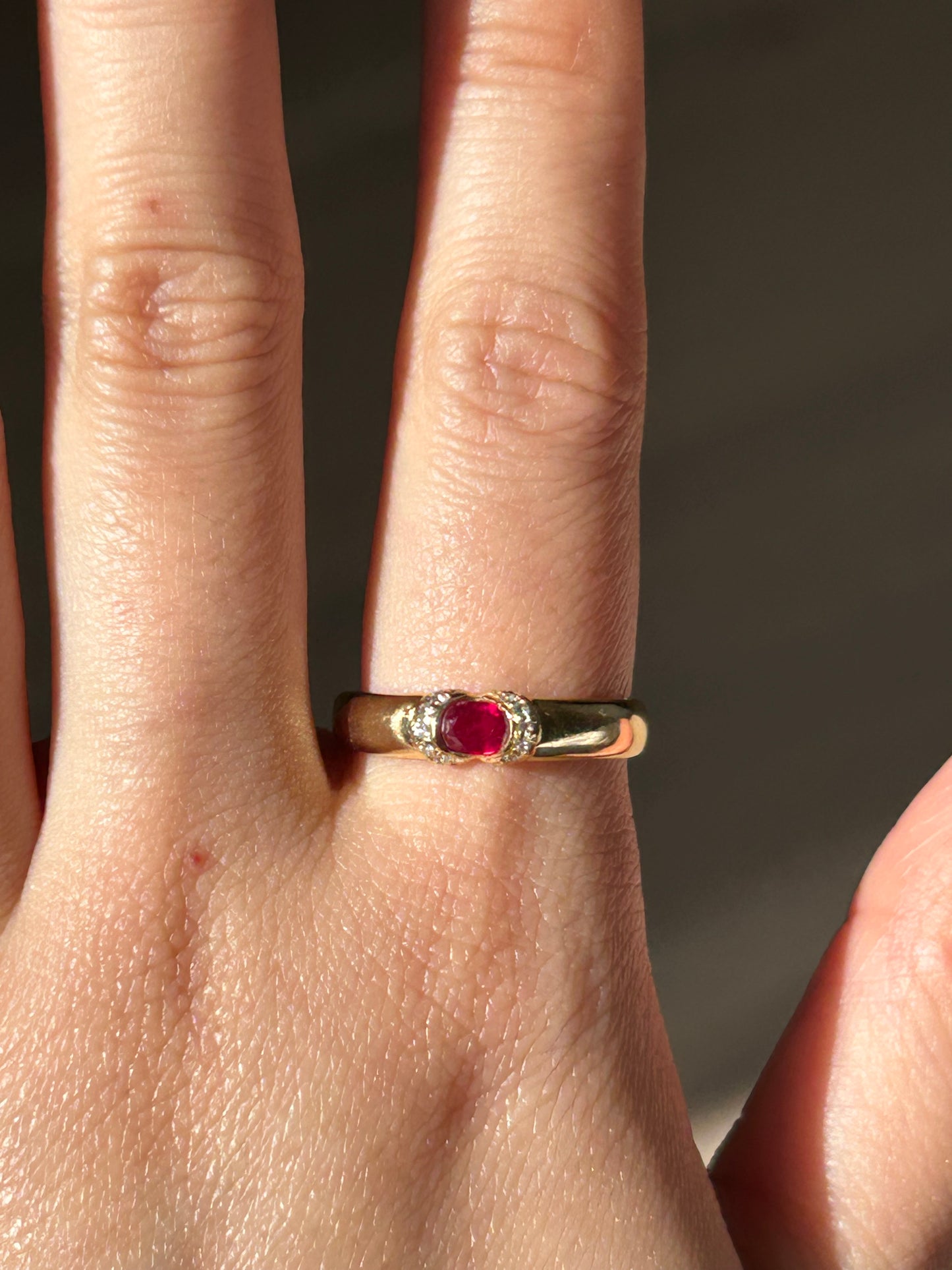 Vintage 18k East West Oval Ruby Half Bezel Ring: US Size 8.25