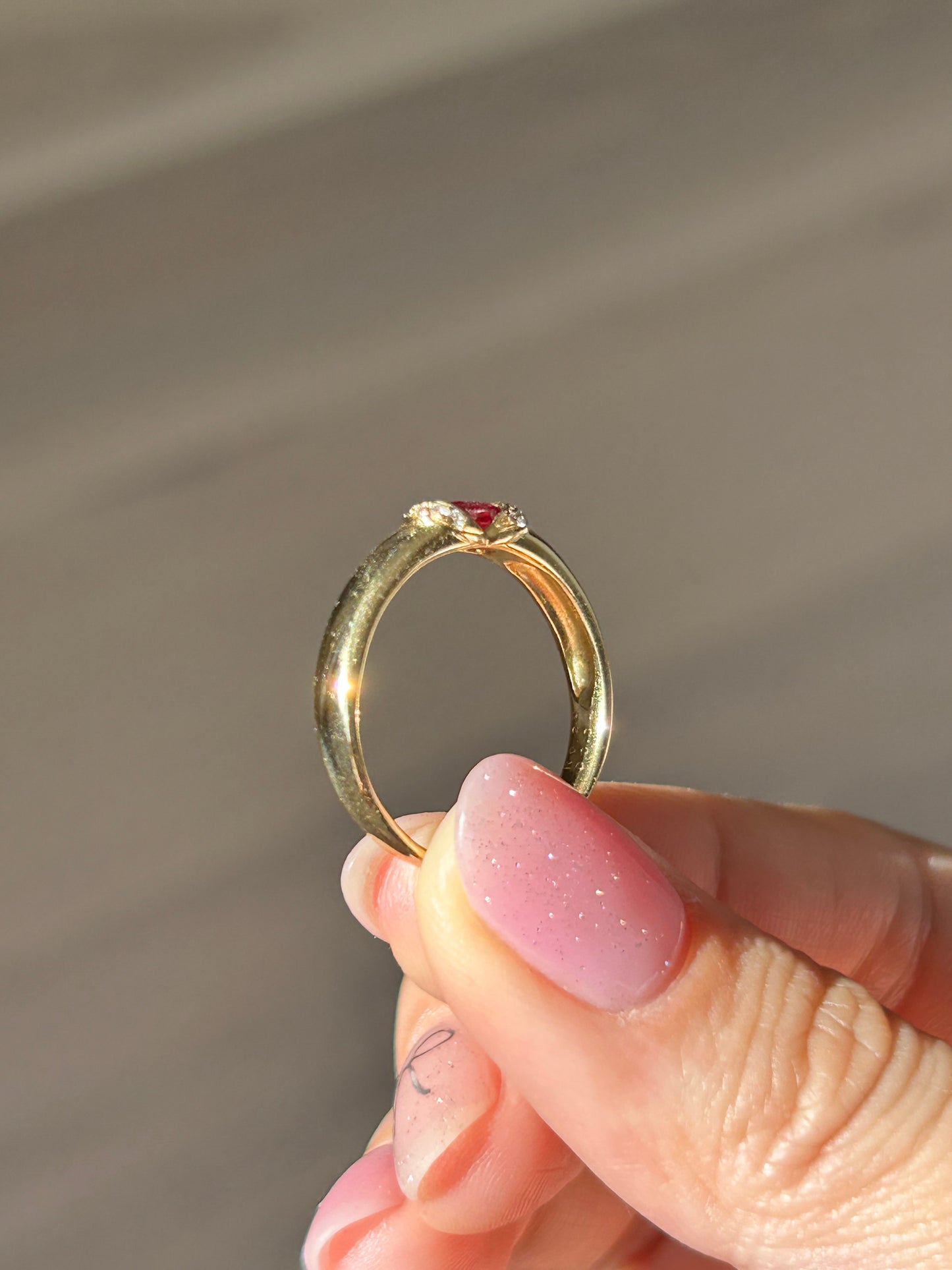 Vintage 18k East West Oval Ruby Half Bezel Ring: US Size 8.25