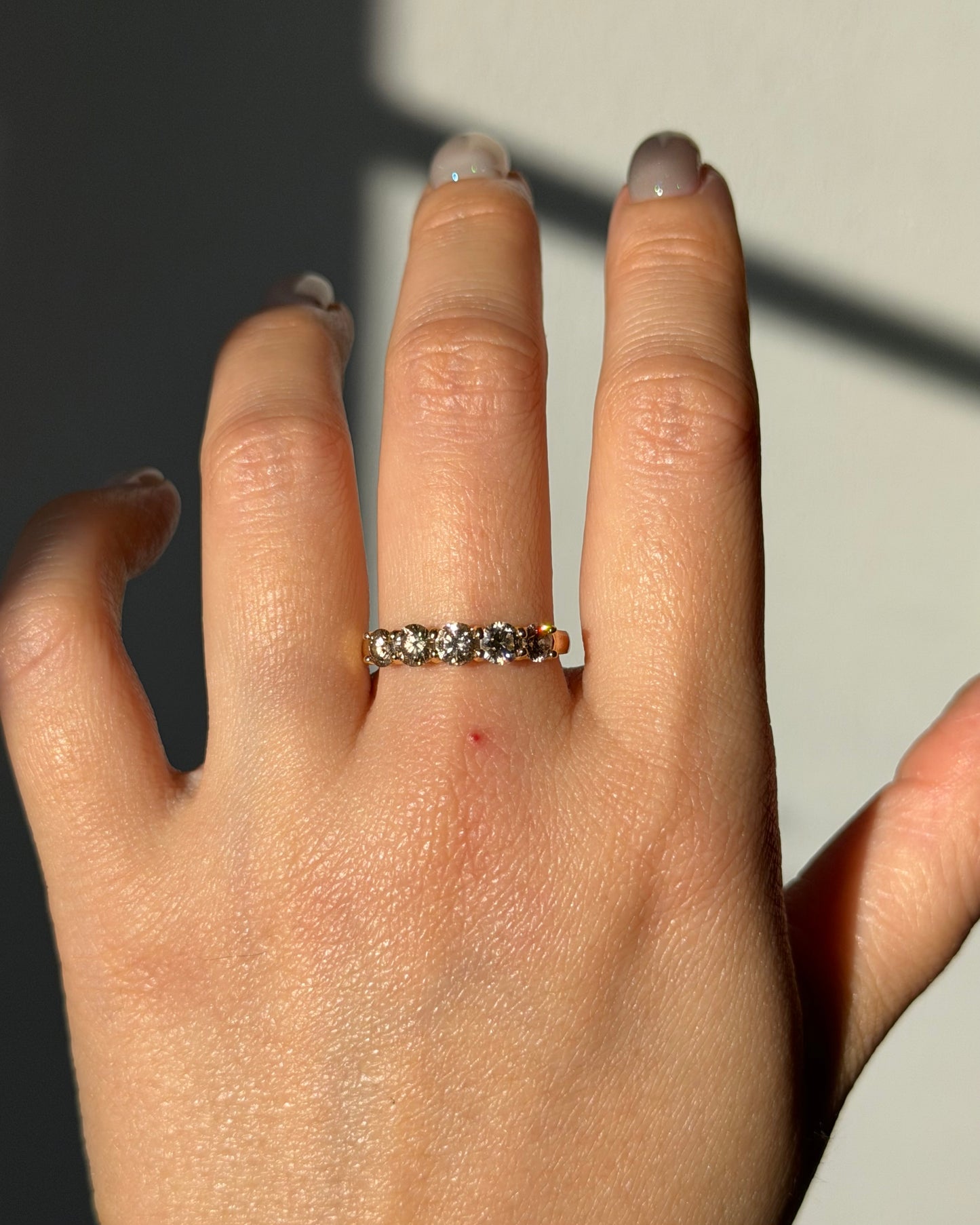 Modern Pre-loved 18k Gold Shared Prong 1.0 CTW Light Brown Diamond Band