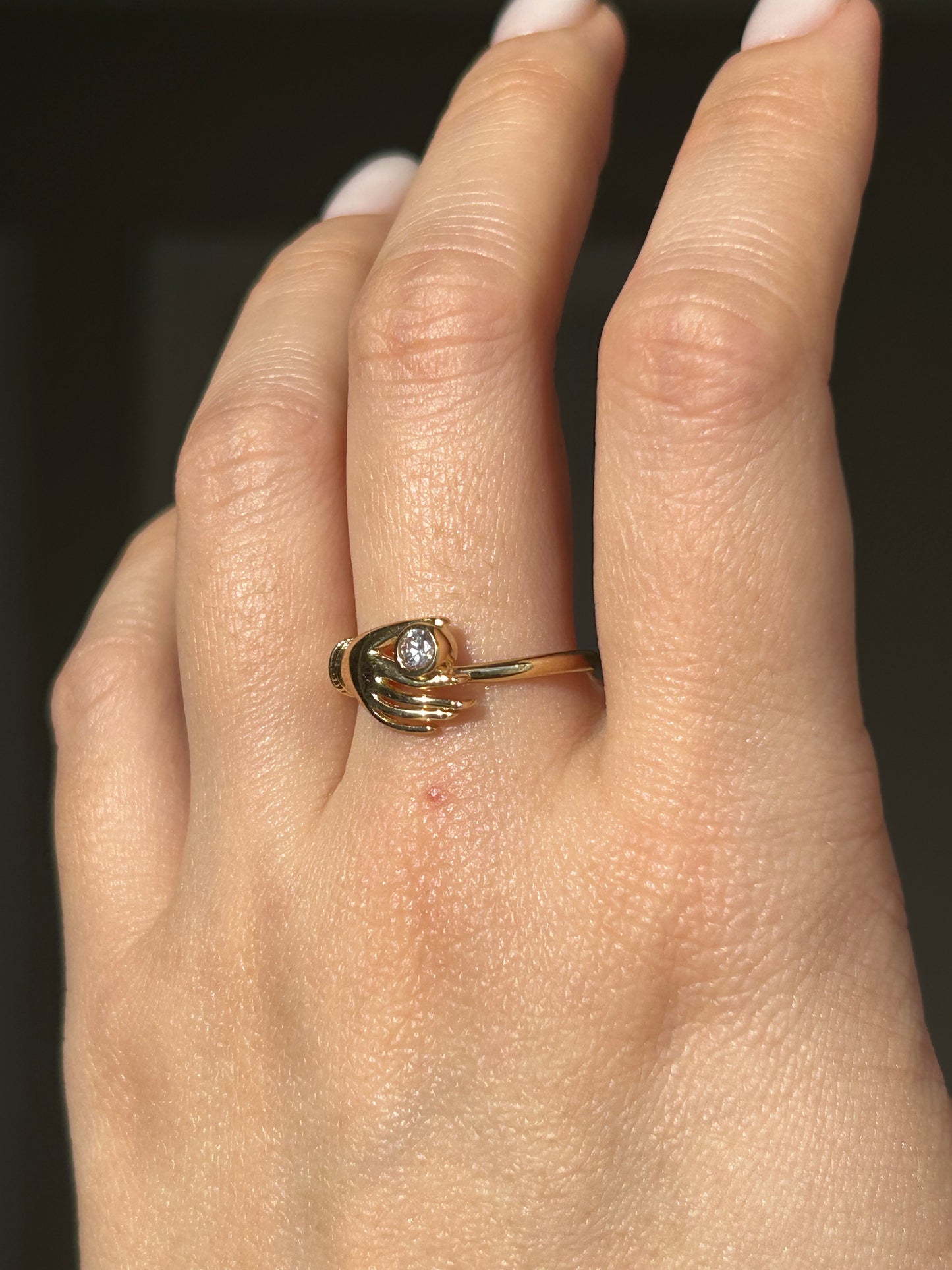 Vintage 18k Gold Hand Motif Ring with a Center Cubic Zirconia