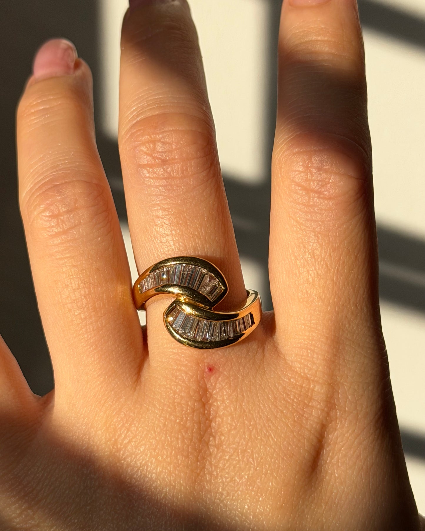 Vintage 18k Gold 1.07CTW Channel Set Baguette Diamond Bypass Ring
