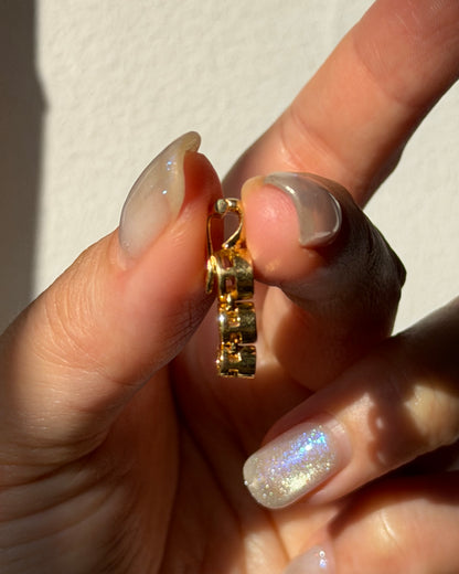 Modern Pre-loved 18k Gold Bezel Set Graduated Diamond Pendant with Clip Bail