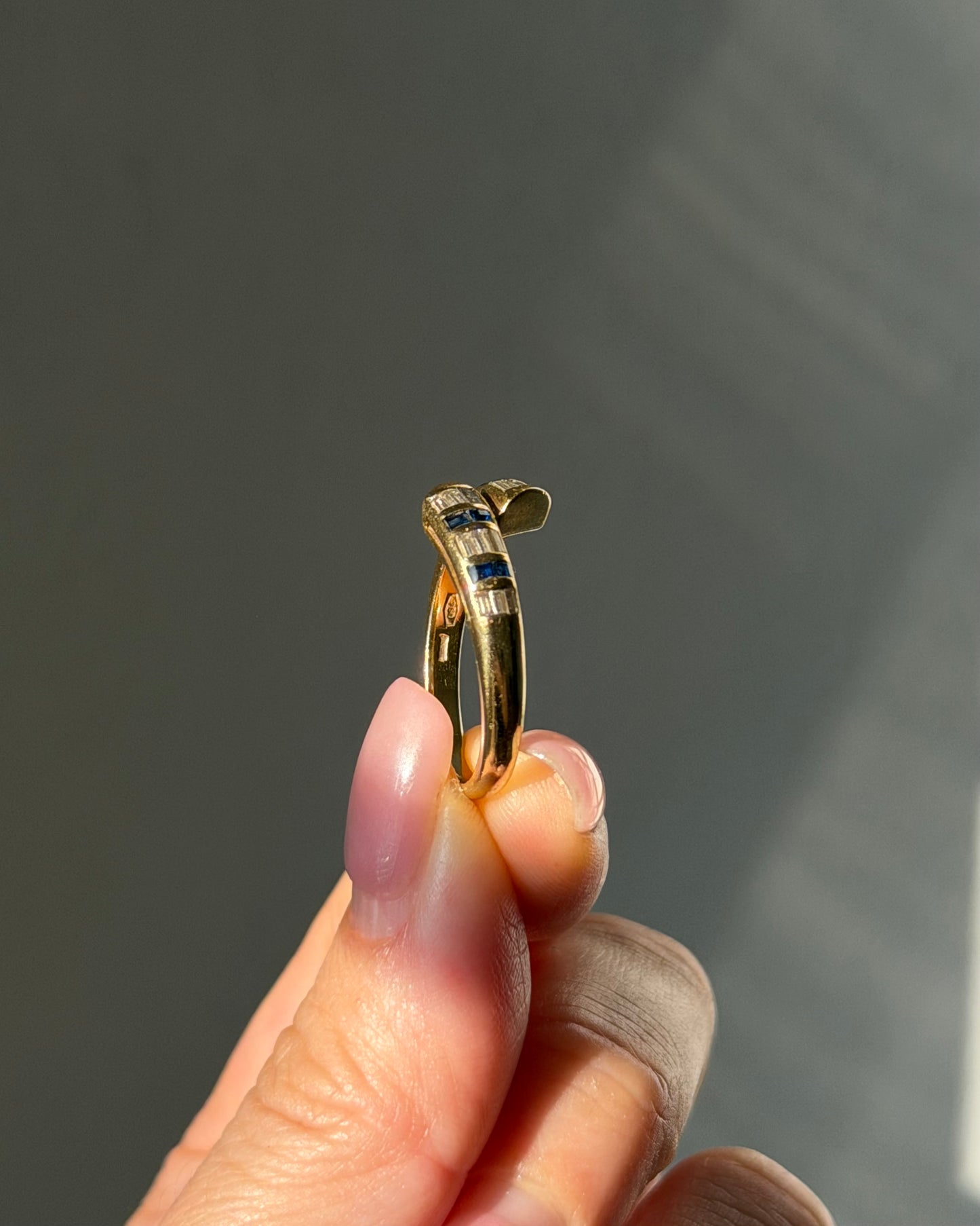 Vintage 18k Gold East-West Baguette Diamond and Sapphire Bypass Ring
