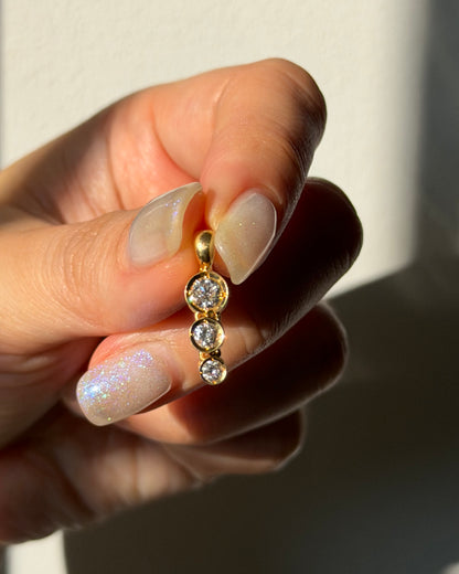 Modern Pre-loved 18k Gold Bezel Set Graduated Diamond Pendant with Clip Bail