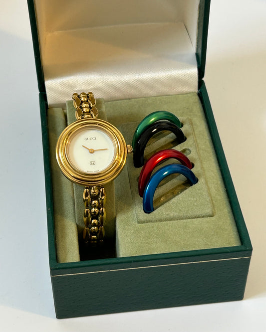 vintage Gucci change bezel watch