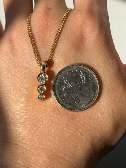 Modern Pre-loved 18k Gold Bezel Set Graduated Diamond Pendant with Clip Bail