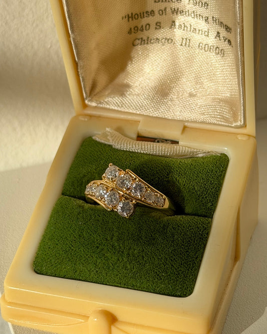 Vintage Circa 1980’s 18k Gold 1.09ctw Graduated Diamond Bypass Ring