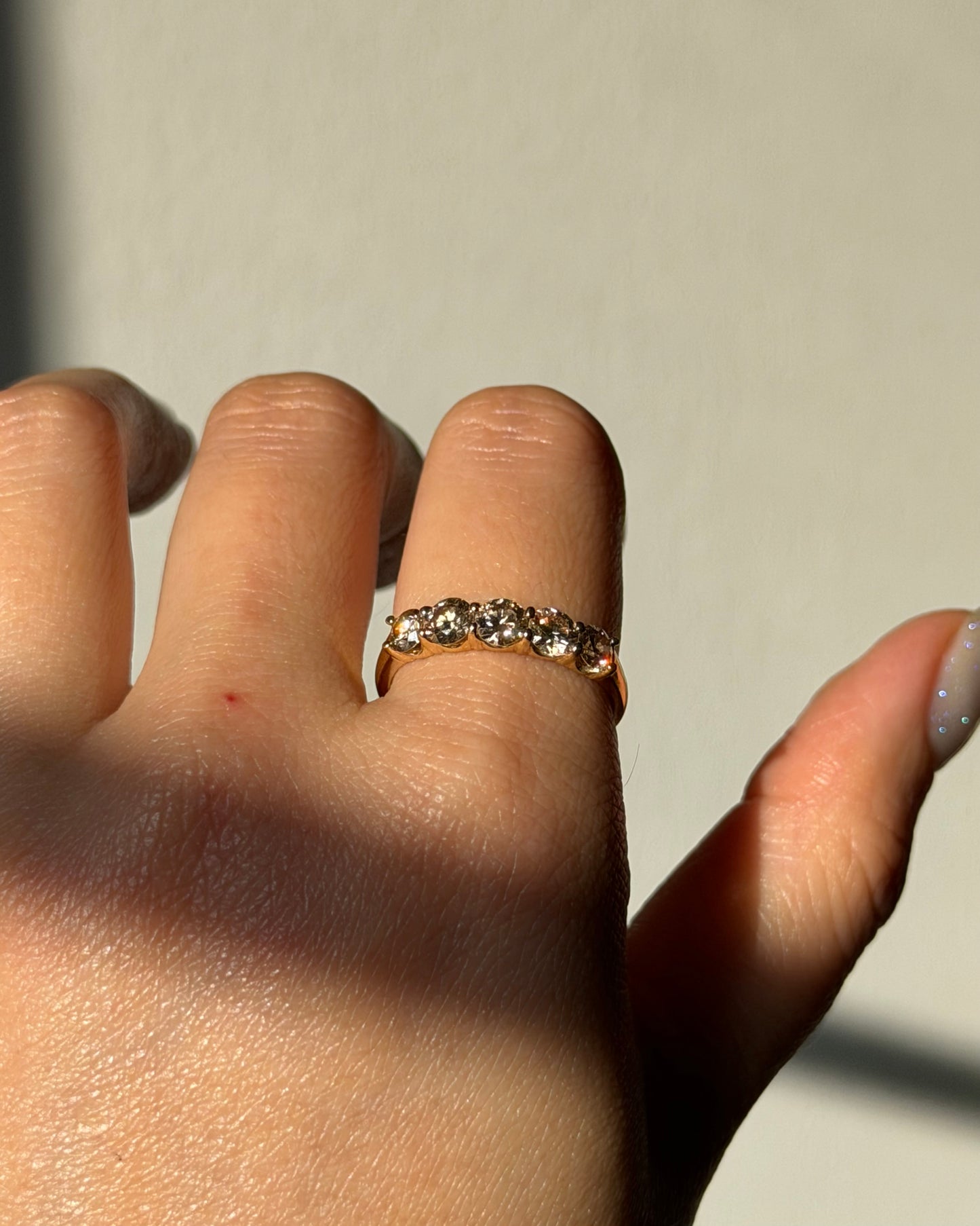Modern Pre-loved 18k Gold Shared Prong 1.0 CTW Light Brown Diamond Band