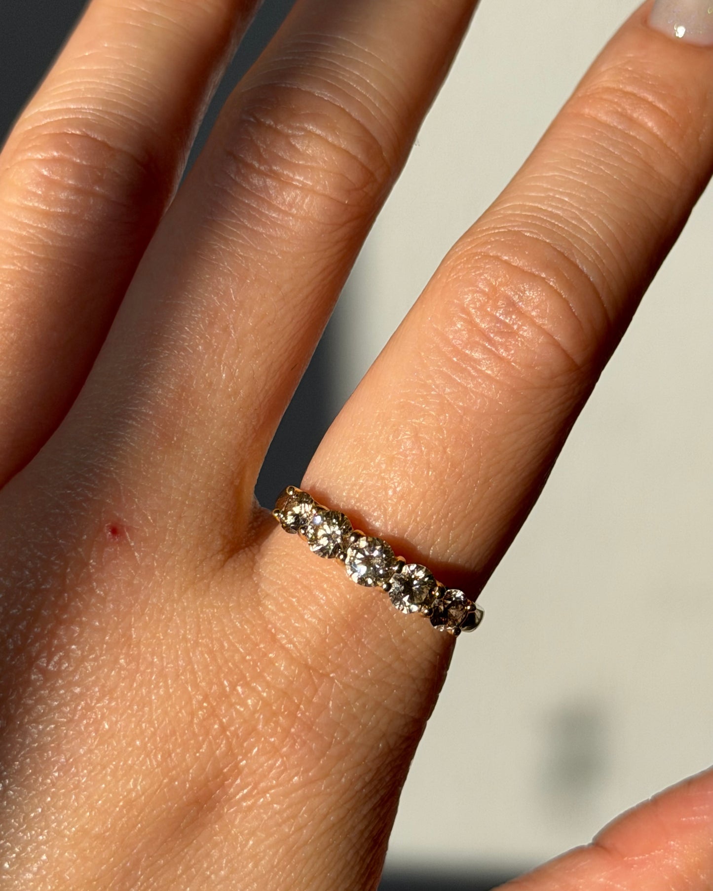 Modern Pre-loved 18k Gold Shared Prong 1.0 CTW Light Brown Diamond Band