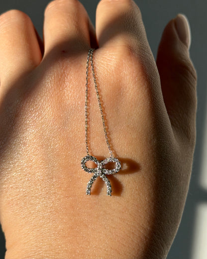 Vintage 18k White Gold Diamond Bow Pendant Necklace