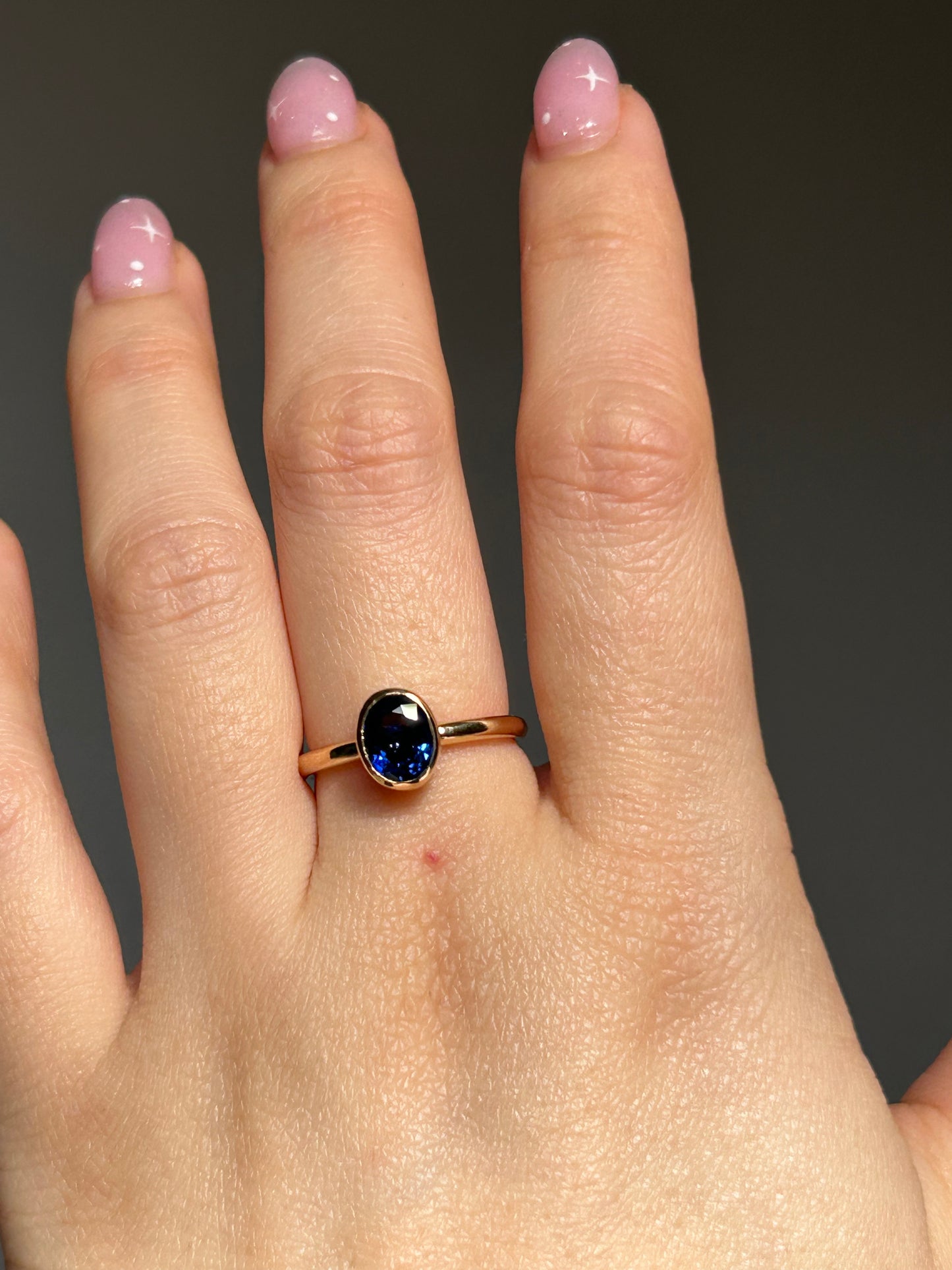 Modern 18k Gold Bezel Set Deep Blue Sapphire Ring