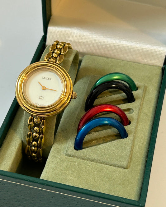 vintage Gucci change bezel watch