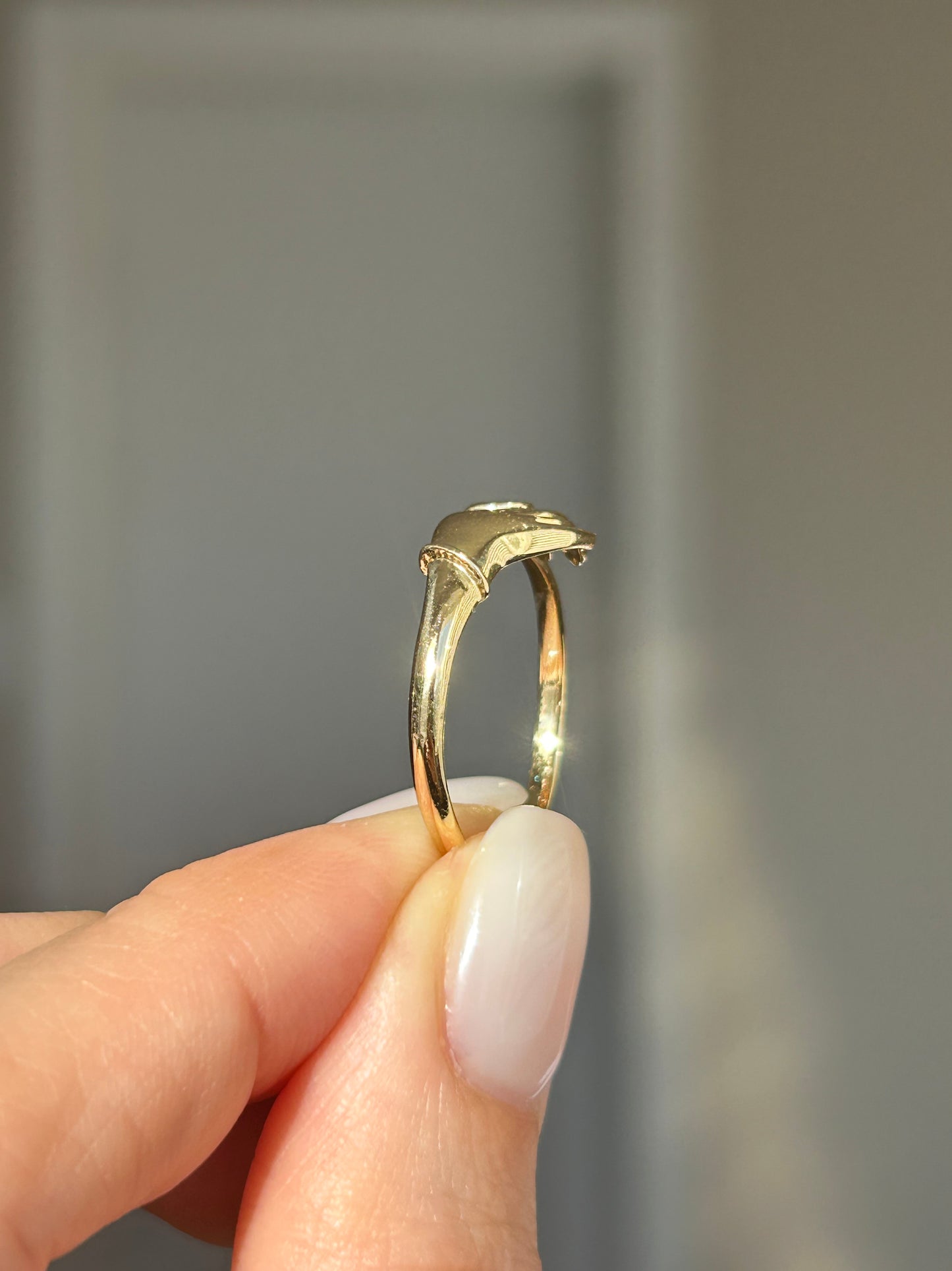 Vintage 18k Gold Hand Motif Ring with a Center Cubic Zirconia