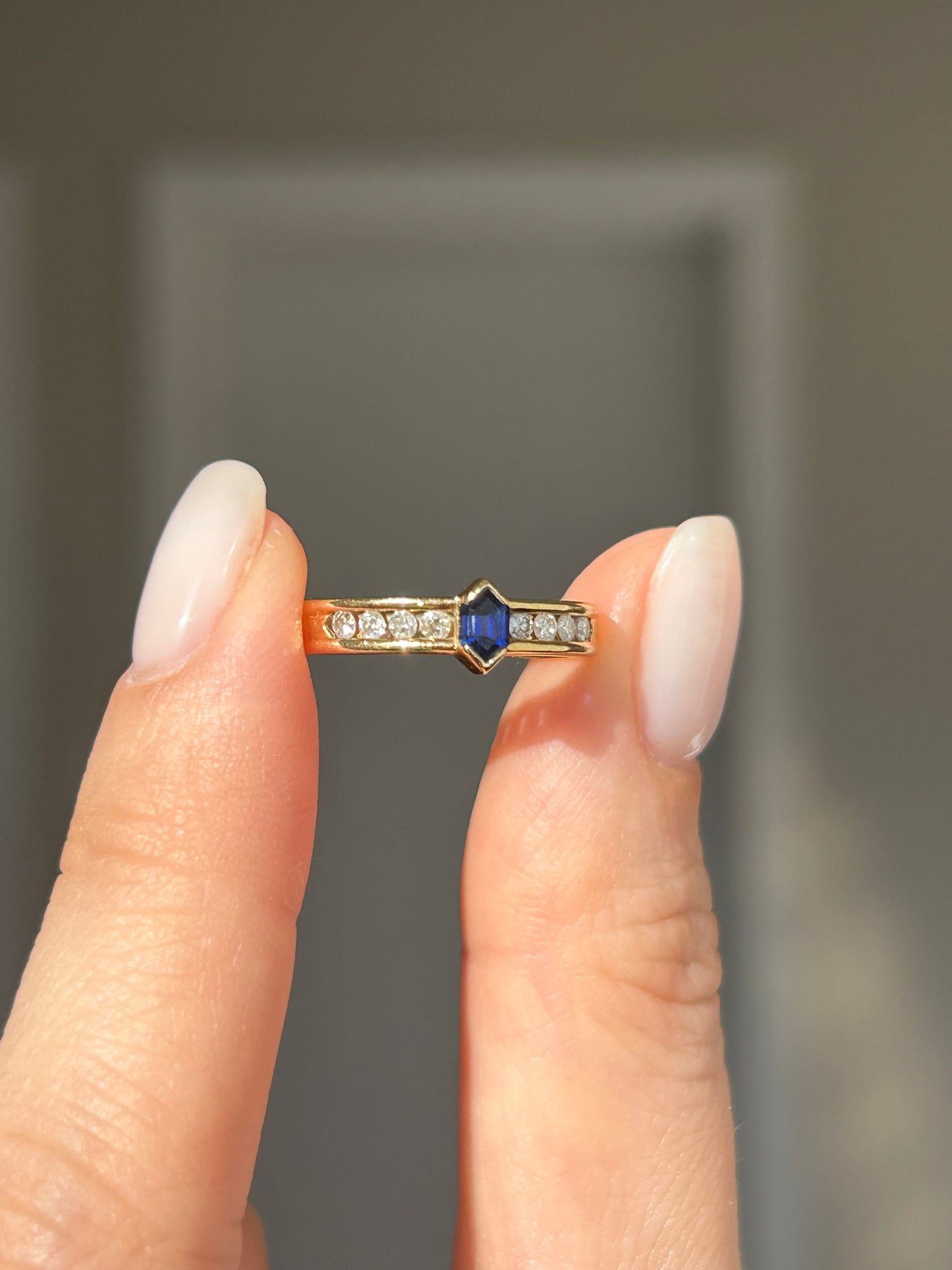 Vintage 18k Shield Step Cut Blue Sapphire Ring with Channel Set Diamonds