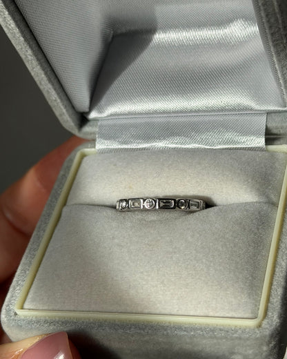 Modern Pre-loved 18k White Gold Bezel Set Baguette and Round Diamond Stacking Band