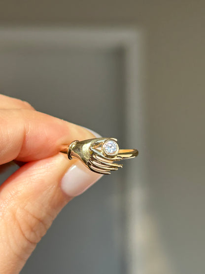 Vintage 18k Gold Hand Motif Ring with a Center Cubic Zirconia