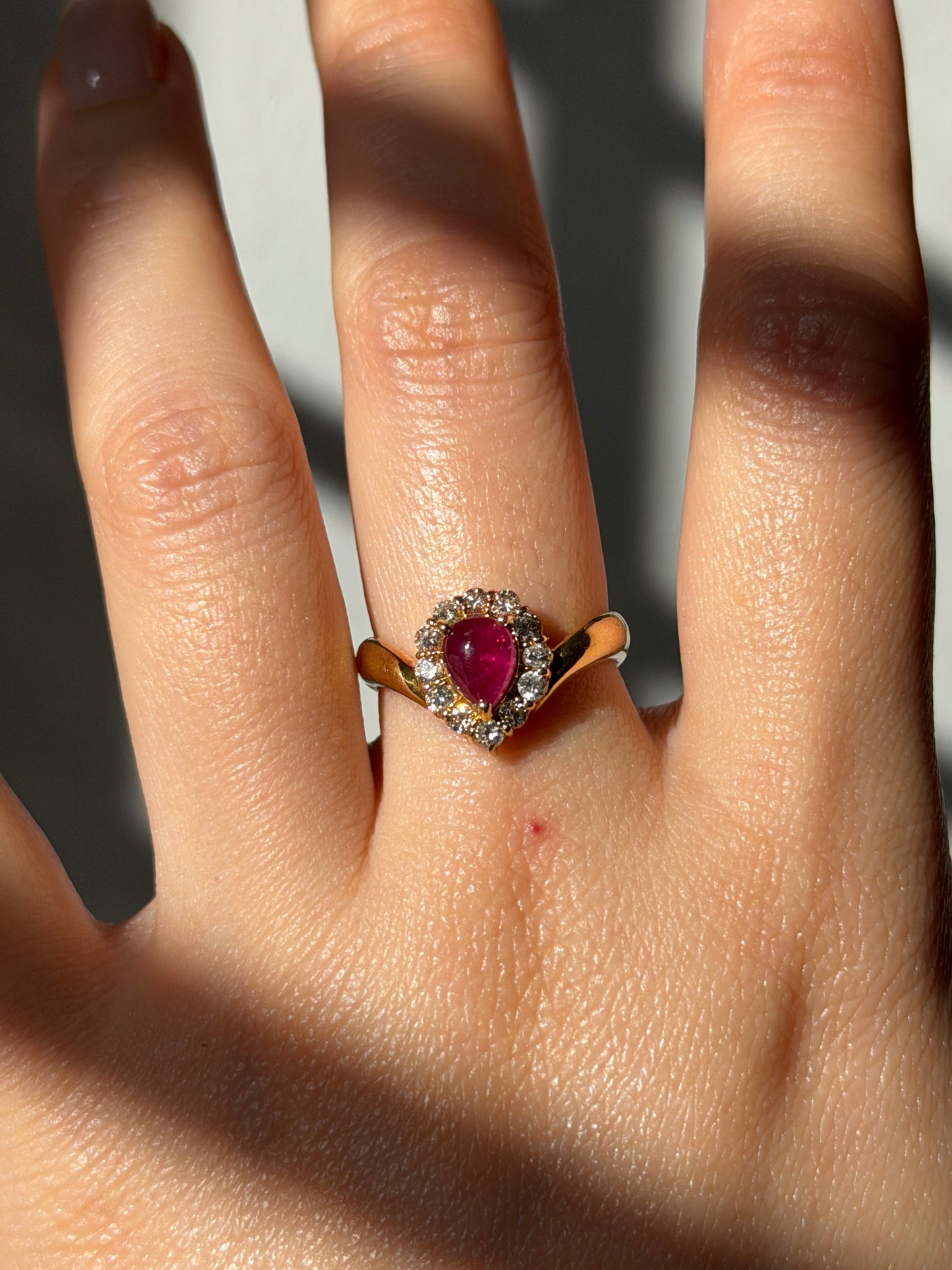 Vintage 18k Gold Pear Shaped Ruby Cabochon Diamond Halo Ring