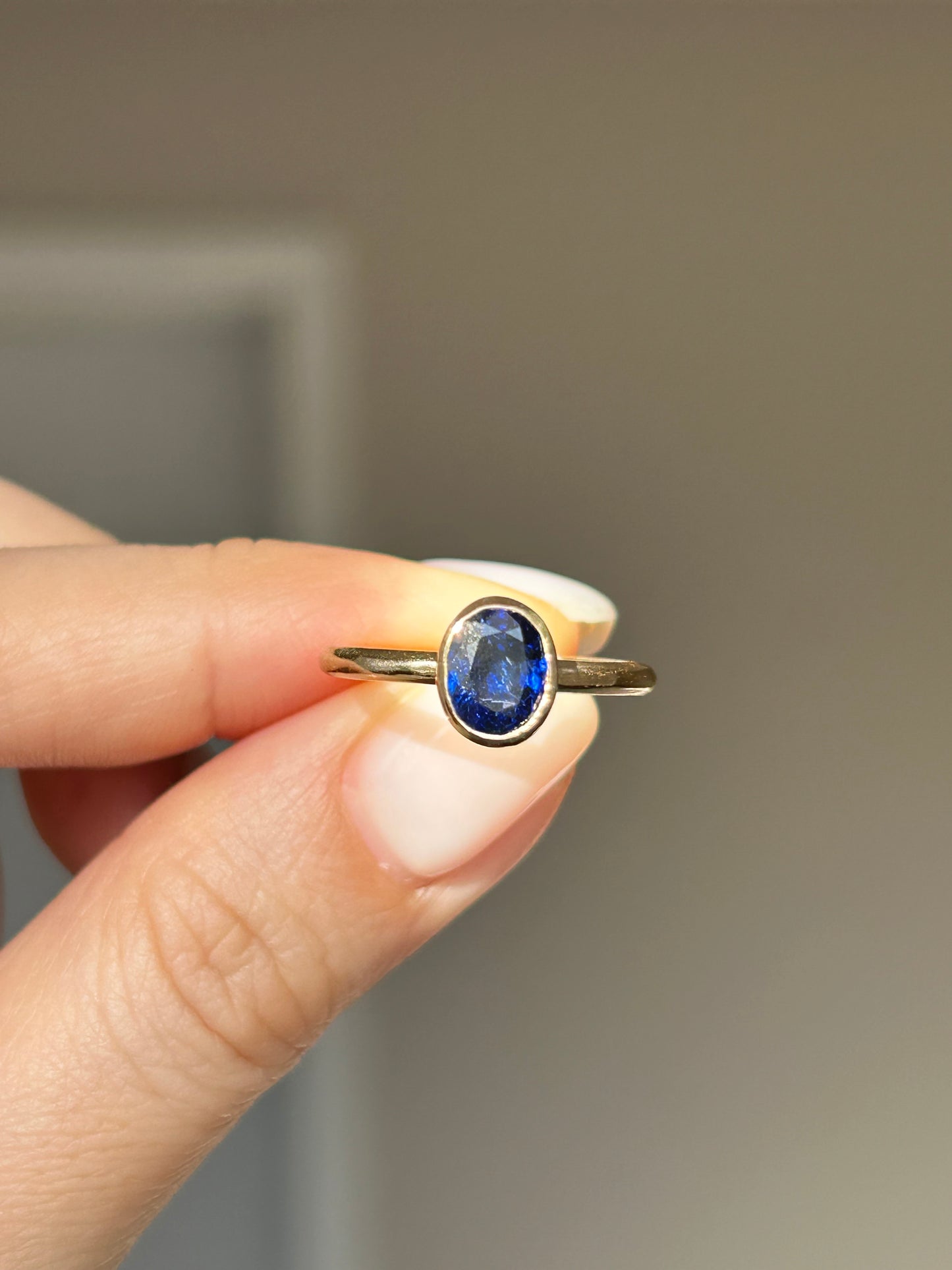 Modern 18k Gold Bezel Set Deep Blue Sapphire Ring