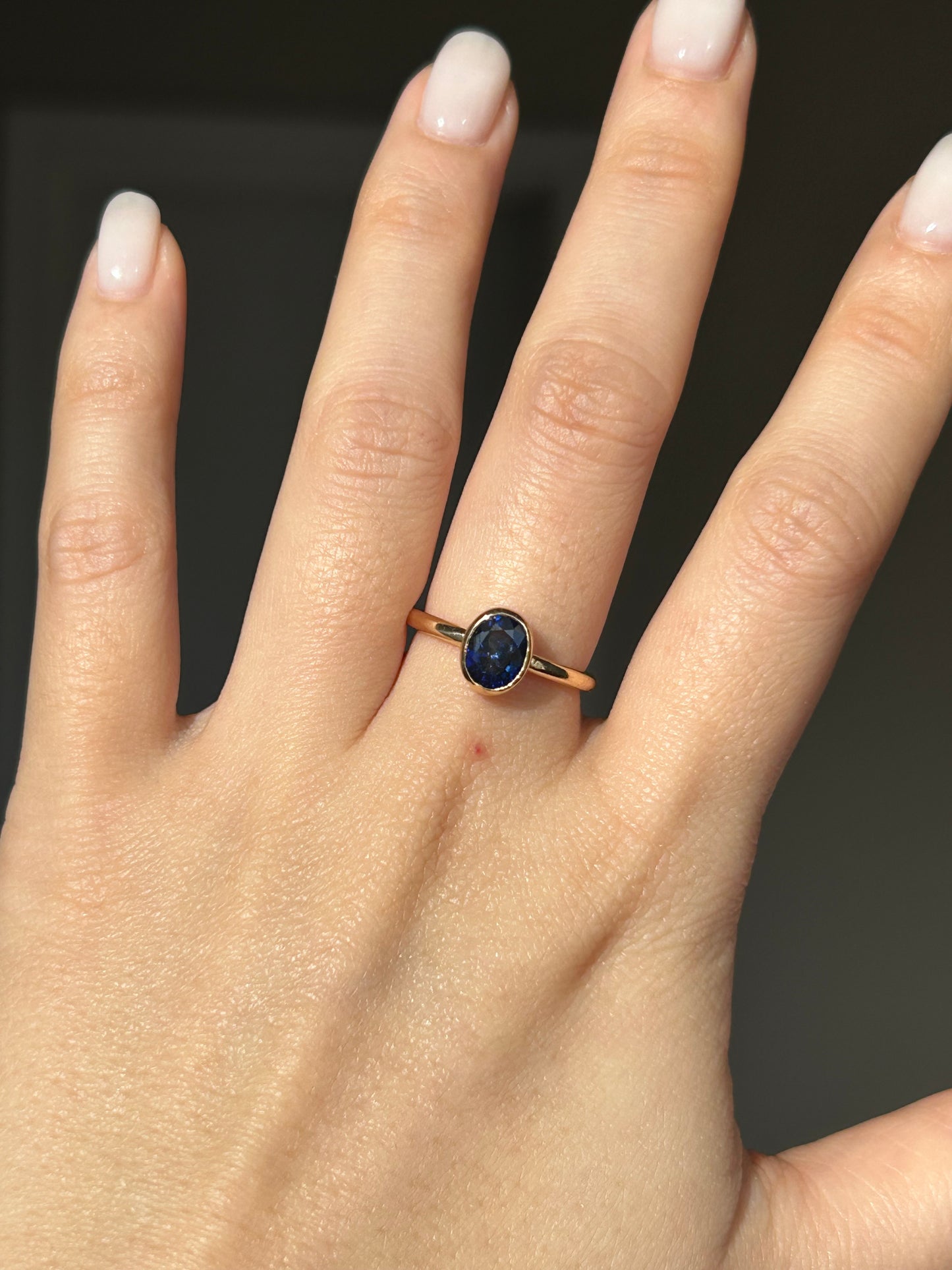 Modern 18k Gold Bezel Set Deep Blue Sapphire Ring