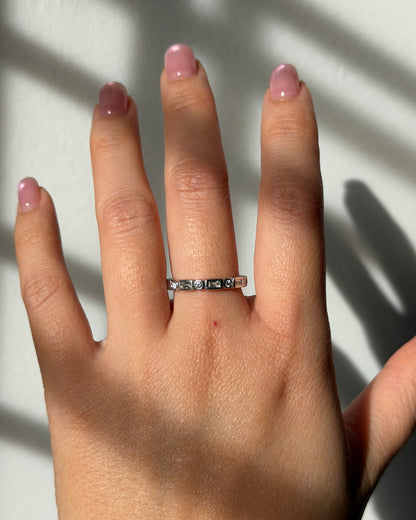 Modern Pre-loved 18k White Gold Bezel Set Baguette and Round Diamond Stacking Band