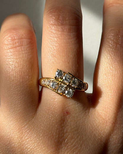 Vintage Circa 1980’s 18k Gold 1.09ctw Graduated Diamond Bypass Ring