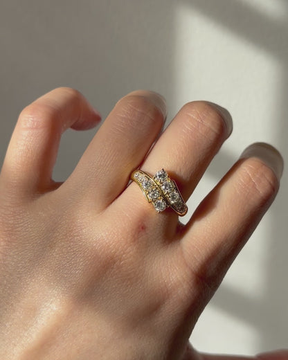 Vintage Circa 1980’s 18k Gold 1.09ctw Graduated Diamond Bypass Ring
