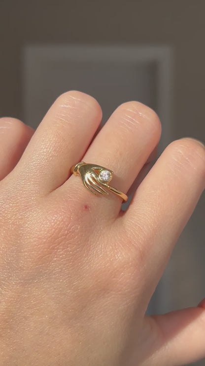 Vintage 18k Gold Hand Motif Ring with a Center Cubic Zirconia